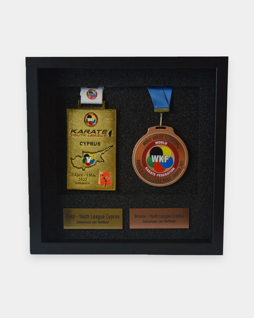 Double medal frame with two karate medals and engraved nameplates